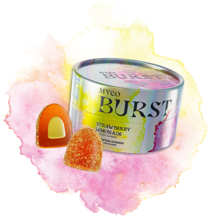MycoBurst Strawberry Lemonade flavored mushroom gummies in a glossy, iridescent tin, displayed with one whole gummy and one sliced open to reveal a pale yellow bursting center, set against a vibrant pink and yellow watercolor splash background.